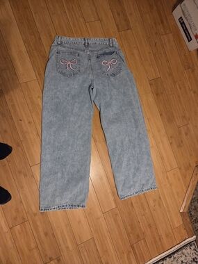 Light Wash Junior Ladies Size 11 Jeans with Pink Bow Back Pockets